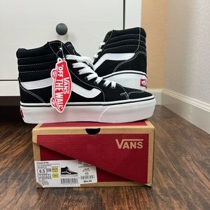 Black and white hightop vans